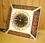 Strawberries circle this clock.  Tole painted by hand.  A cheery addition to your kitchen.  8