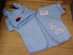This fleece jacket and hat is in 3 month size.  The bunny and ladybug are hand appliqued.  This set is also available in pink or yellow.  Two piece set is $15.00.