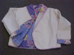 One of a kind jacket is lined with pieced cottons in violets and pink or greens.   Custom orders welcome, many sizes available$75.95
