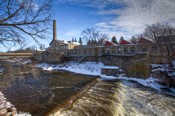 Beatty Mill Built in about 1878 in the town of Fergus, Ontario, it is currently the Fergus market. The Fergus Cascade and the Grand River are in front.
