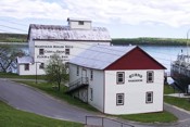 Manitowaning Roller Mills Built as a Gristmill and Flour Mill in Manitowaning on Manitoulin Island in 1883. It is now home to an agricultural exhibit which is open daily in July and August.
